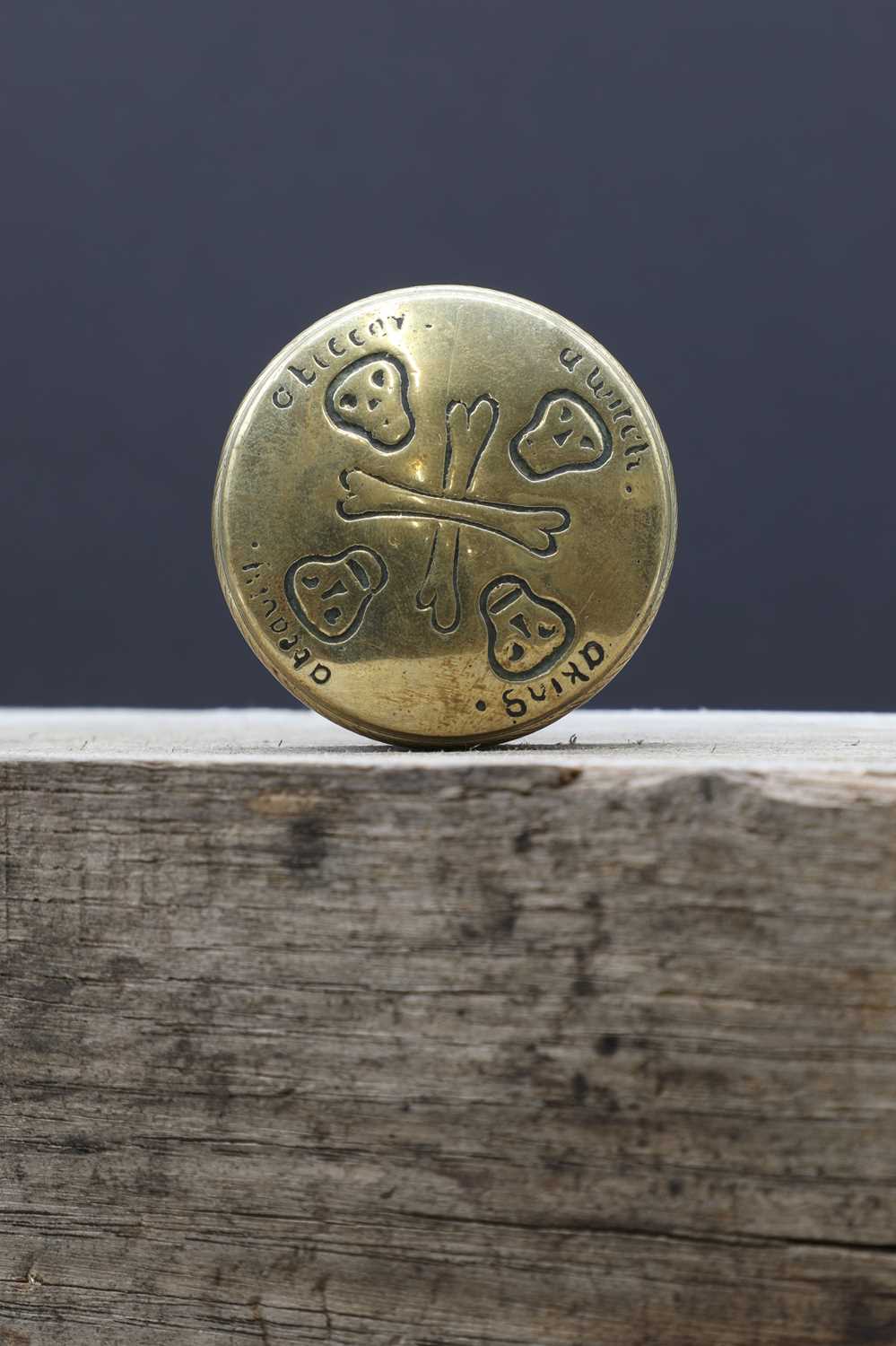 Lot 49 - A memento mori folk art brass snuffbox