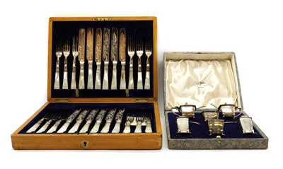 Lot 41 - A cased silver cruet set