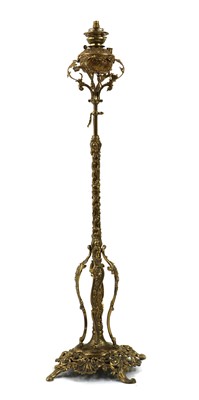 Lot 379 - A Victorian brass rise and fall standard lamp