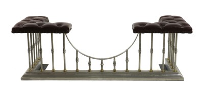 Lot 385 - A brushed steel and buttoned red leather club fender