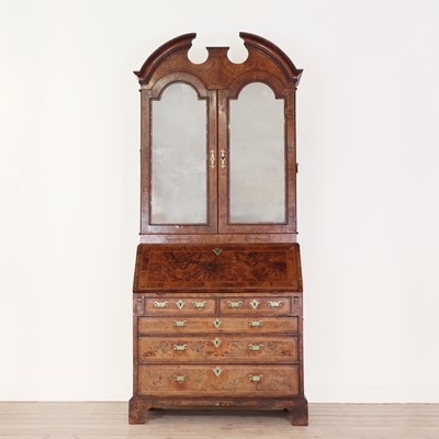 Lot 18 - A George I walnut bureau bookcase