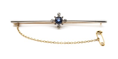 Lot 15 - An Edwardian sapphire and diamond bar brooch