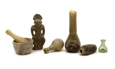 Lot 247 - A collection of Roman glass vessels