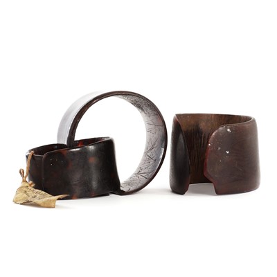 Lot 66 - Three turtleshell currency bracelets