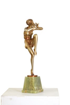 Lot 179 - An Art Deco cold-painted figure, 'The Flute Player'