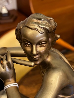 Lot 179 - An Art Deco cold-painted figure, 'The Flute Player'