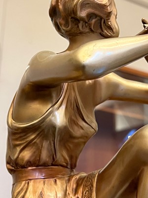 Lot 179 - An Art Deco cold-painted figure, 'The Flute Player'