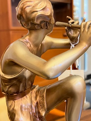 Lot 179 - An Art Deco cold-painted figure, 'The Flute Player'