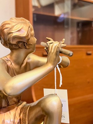 Lot 179 - An Art Deco cold-painted figure, 'The Flute Player'