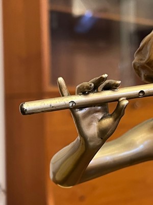 Lot 179 - An Art Deco cold-painted figure, 'The Flute Player'