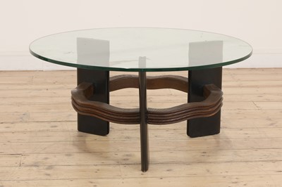 Lot 414 - An Italian carved oak and ebonised side table