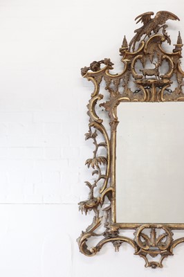 Lot 149 - A carved giltwood pier glass in the manner of Thomas Johnson