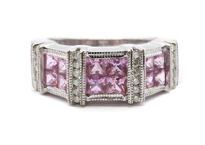 Lot 111 - A 14ct white gold pink sapphire and diamond ring