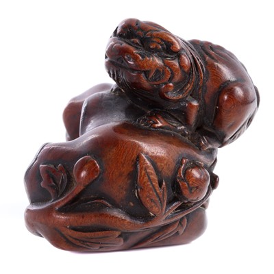 Lot 198 - A carved boxwood netsuke