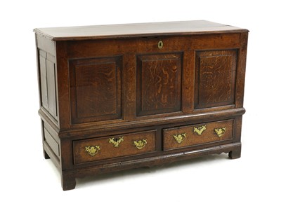 Lot 395 - An oak mule chest