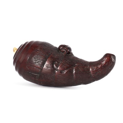 Lot 184 - A carved hardwood and ivory netsuke