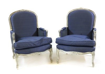Lot 472 - A pair of blue upholstered armchairs