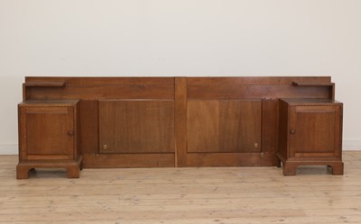 Lot 582 - A Cotswold School oak headboard