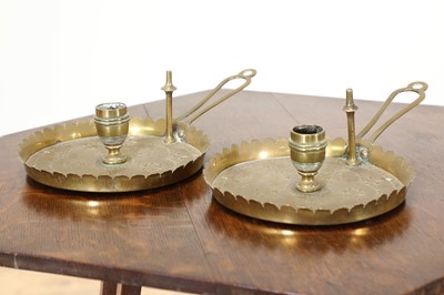Lot 93 - A pair of Arts and Crafts candlesticks