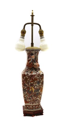 Lot 218 - A porcelain table lamp