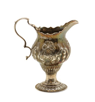 Lot 3 - A George III silver cream jug