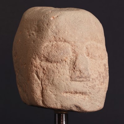 Lot 211 - A Celtic red sandstone ceremonial head