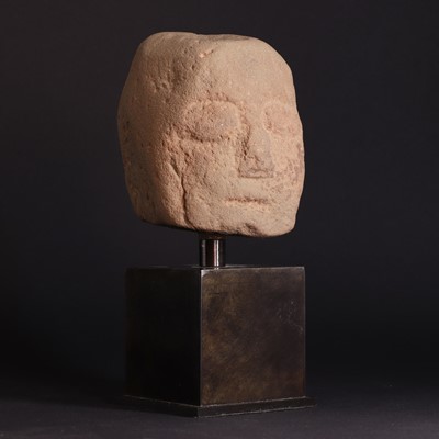 Lot 211 - A Celtic red sandstone ceremonial head