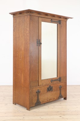 Lot 37 - A Heal & Son 'St Ives' oak wardrobe