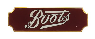 Lot 364 - A reverse painted glass Boots advertising sign
