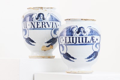 Lot 119 - A pair of delftware drug jars
