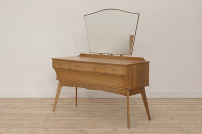 Lot 631 - A walnut dressing table