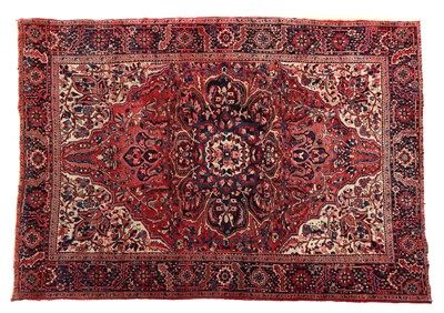 Lot 414 - A large Heriz carpet