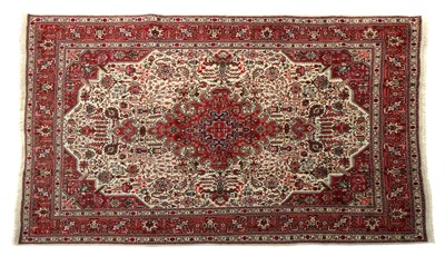 Lot 413 - A Tabriz carpet