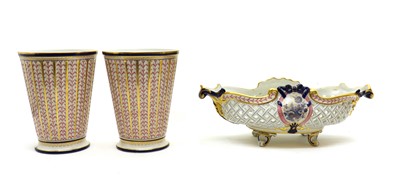 Lot 185 - A pair of Mangani porcelain vases