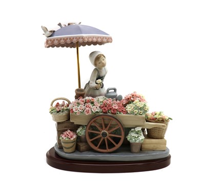 Lot 195 - A Lladro porcelain 'Flowers of the Season' figure