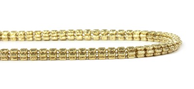 Lot 1298 - A 9ct gold hollow cylinder bead link necklace