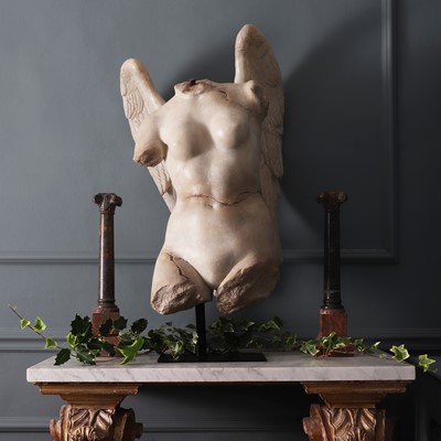 Lot 6 - A fibreglass winged torso