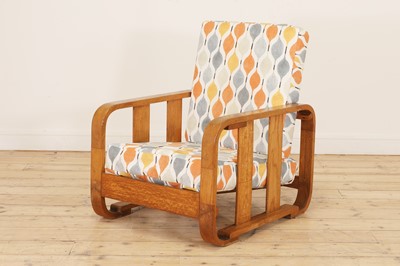 Lot 179 - An oak 'Tank' armchair