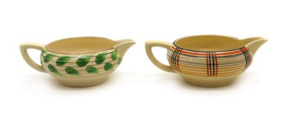 Lot 95A - A pair of Clarice Cliff Lynton shape gravy boats