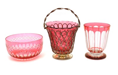 Lot 41 - A Victorian silver swing-handled sugar basket