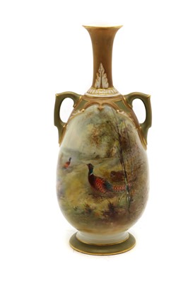 Lot 214 - A Royal Worcester porcelain twin handle vase