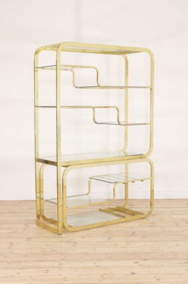 Lot 336 - A brass two-part freestanding wall shelf