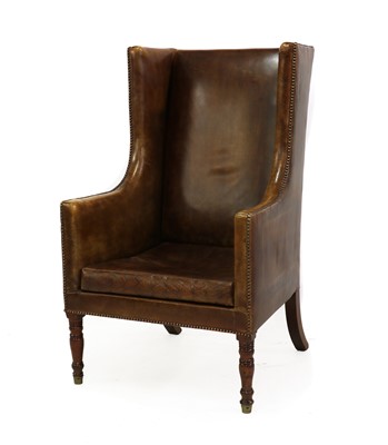 Lot 505 - A Regency style leather library chair
