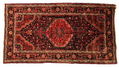 Lot 392 - A Qashqai carpet