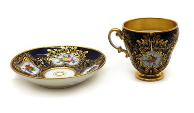 Lot 203 - A Russian Imperial porcelain cup and saucer