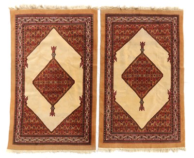 Lot 412 - A pair of Senneh rugs