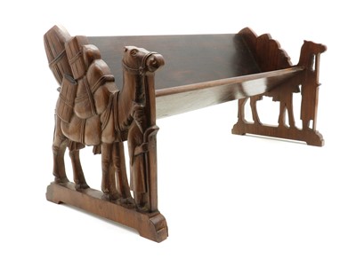 Lot 260 - A walnut book rack