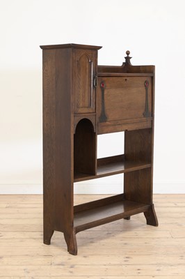 Lot 99 - An Arts and Crafts oak student's bureau