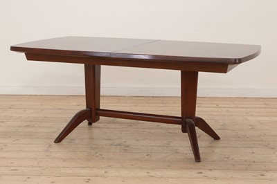 Lot 633 - A Gordon Russell mahogany and Bombay rosewood 'Burford' dining table