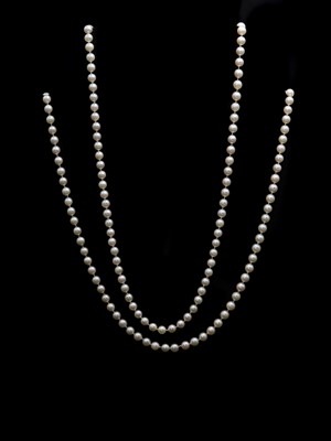Lot 1340 - Two opera length uniform cultured freshwater pearl necklaces